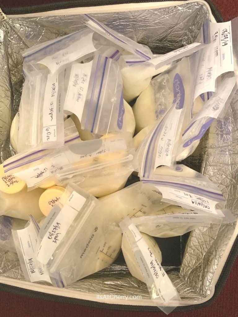 labeled bottles of pumped breast milk